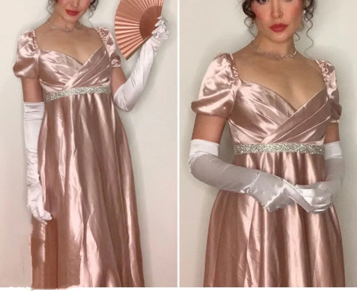 A light pink satin dress with a square neckline and bubble sleeves designed in a retro and elegant style, and a cross breasted rhinestone waistband outlining the curves, by YiHuiw