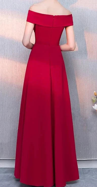 A red formal dress with a one shoulder design and a waist cinching hem, suitable for dinner parties by YiHuiw