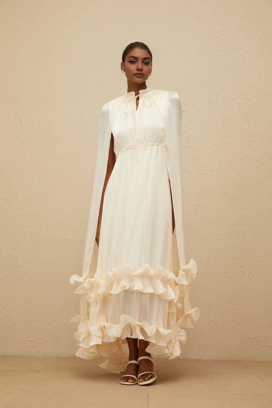 Cream Cape - Sleeve Maxi Dress with Ruffled Hem Intemporelle Neutral Cape Pleated Midi Dress Evening Dress by YiHuiw