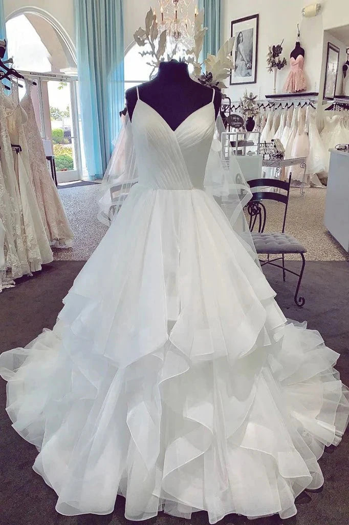 Deep V-neck strap with pleated design on the upper body, paired with a sheer shawl and a multi-layered irregular mesh skirt by YiHuiw