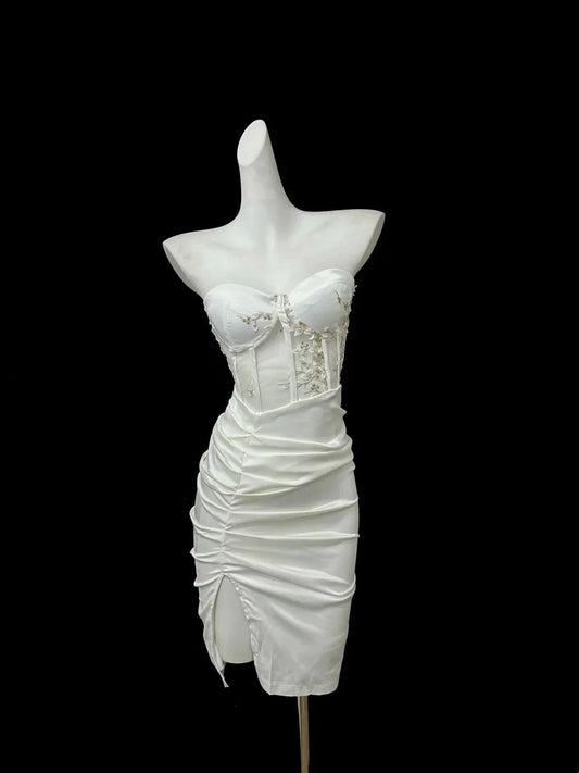 Elegant white strapless embroidered slim skirt with pleated slit design showcasing sexy charm by YiHuiw