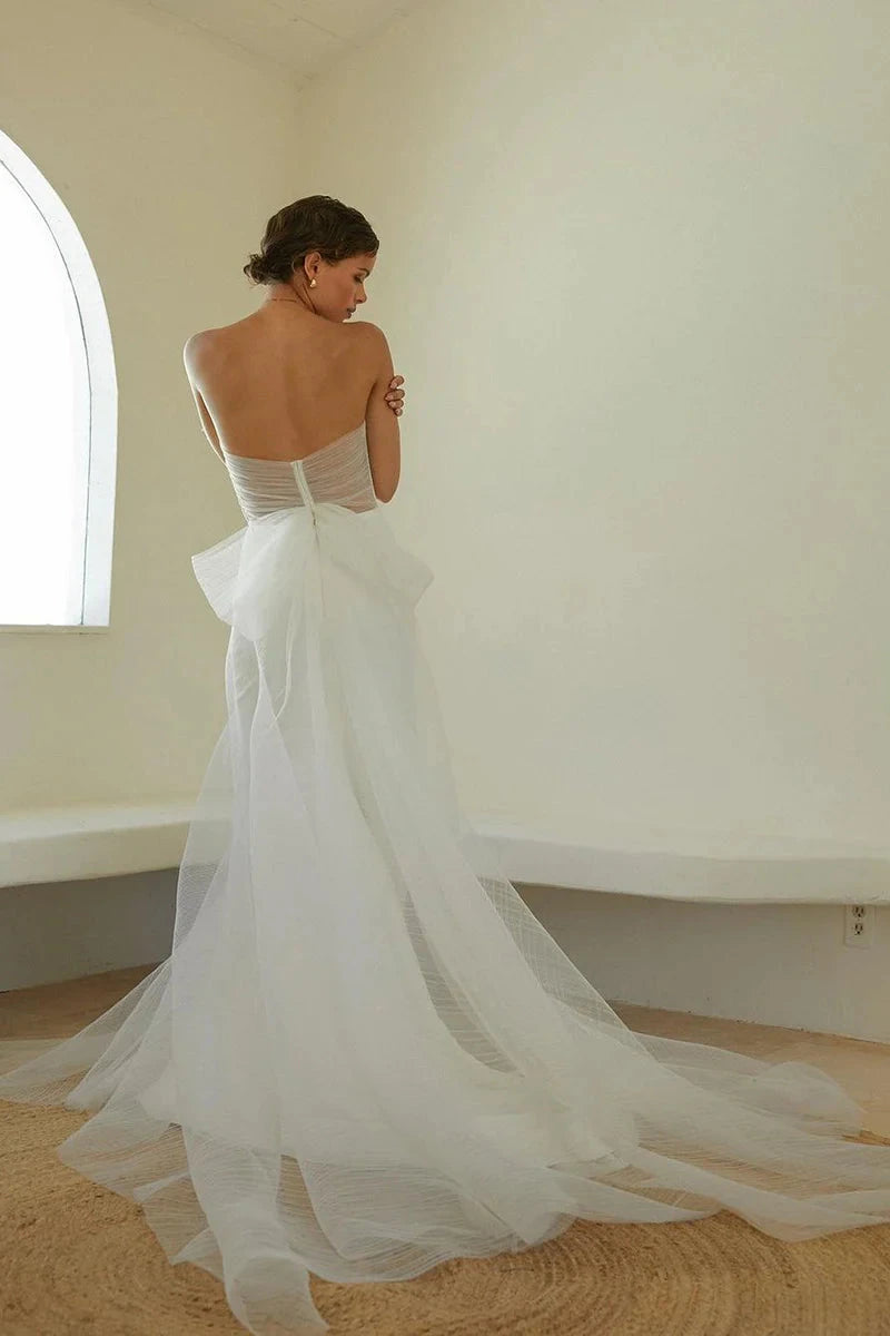 Ethereal Tulle Mermaid Strapless Sweetheart Low-Back Oversized-Bow Train Wedding Dress by YiHuiw