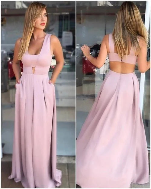 Light pink long dress with deep V-neckline and hollow chest design suitable for dinners, parties, etc by YiHuiw