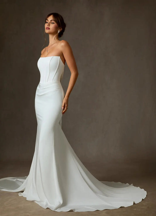 Minimalist satin mermaid strapless button-back chapel train studio wedding dress by YiHuiw