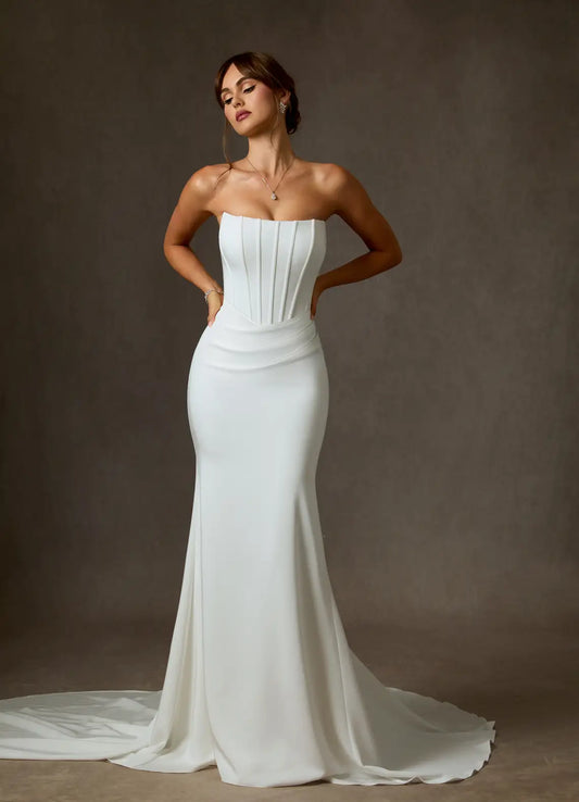Minimalist satin mermaid strapless button-back chapel train studio wedding dress