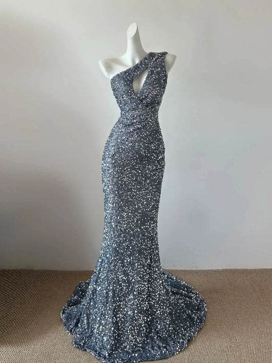 Silver grey one shoulder sequined fish tail long dress with unique hollow cut, suitable for formal dinners and parties by YiHuiw