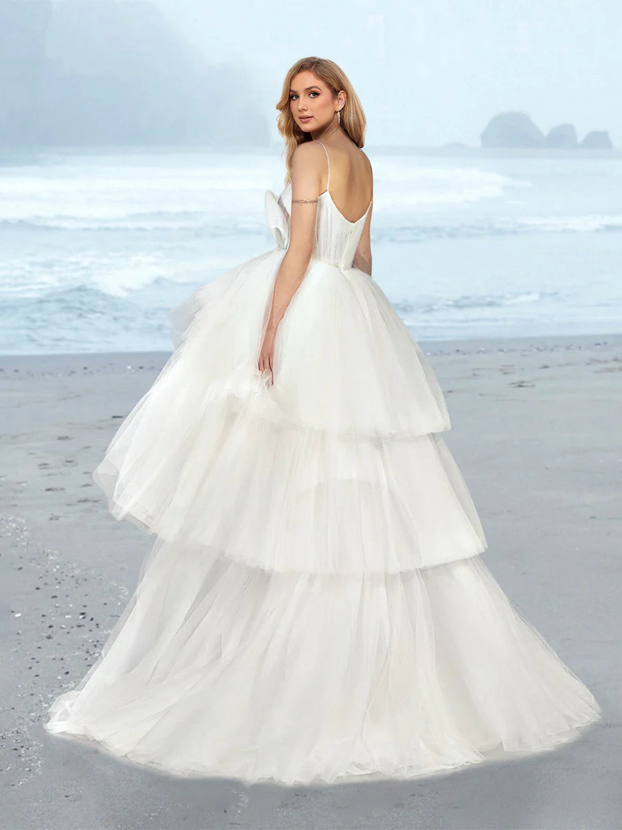 Spaghetti Strap V Neck Tulle Wedding Dress with Bow Decor Tiered Ruffle Sweep Train Bridal Dress