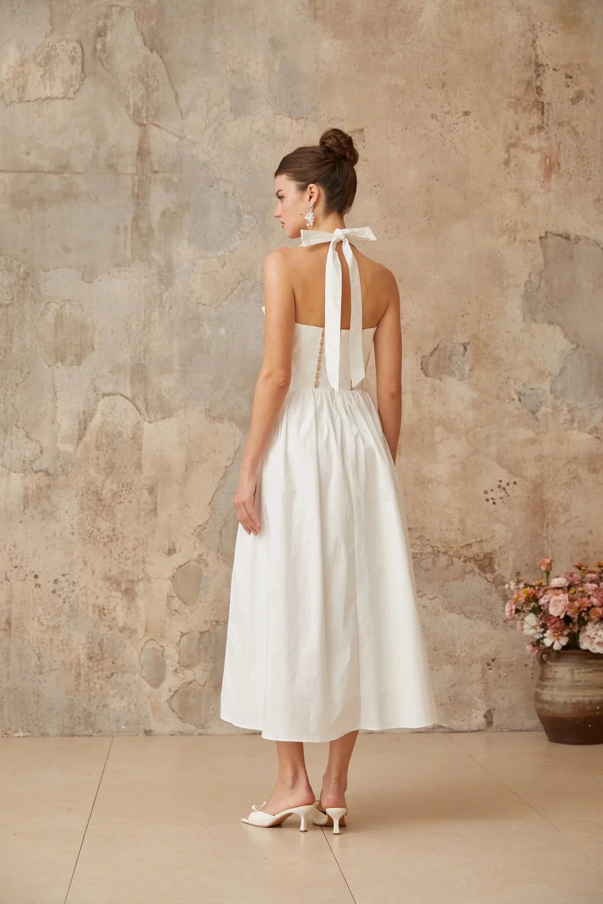 White Halter Neck Midi Dress with Corset Detail and Floral Accents white lace-up-detail shirred midi dress Evening Dress by YiHuiw