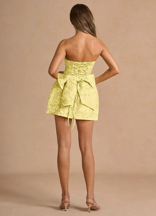 Yellow Strapless Jacquard Mini Dress with Lace - Up Back and Bow Detail Hadleigh Yellow Mini Dress Homecoming Dresses by YiHuiw