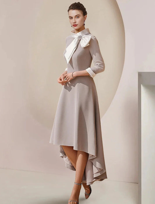 A-Line Mother of the Bride Dress Formal Wedding Guest Party Elegant High Neck Asymmetrical Tea Length Satin 3/4 Length Sleeve with Bow(s) Crystal Brooch by YiHuiw
