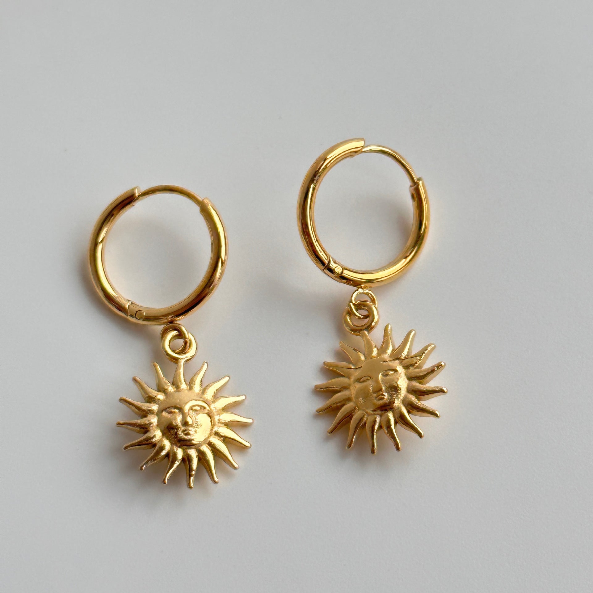 Gold Earrings Temperament Light Luxury Sun Element Trend Pendant Earrings Titanium Steel Plated