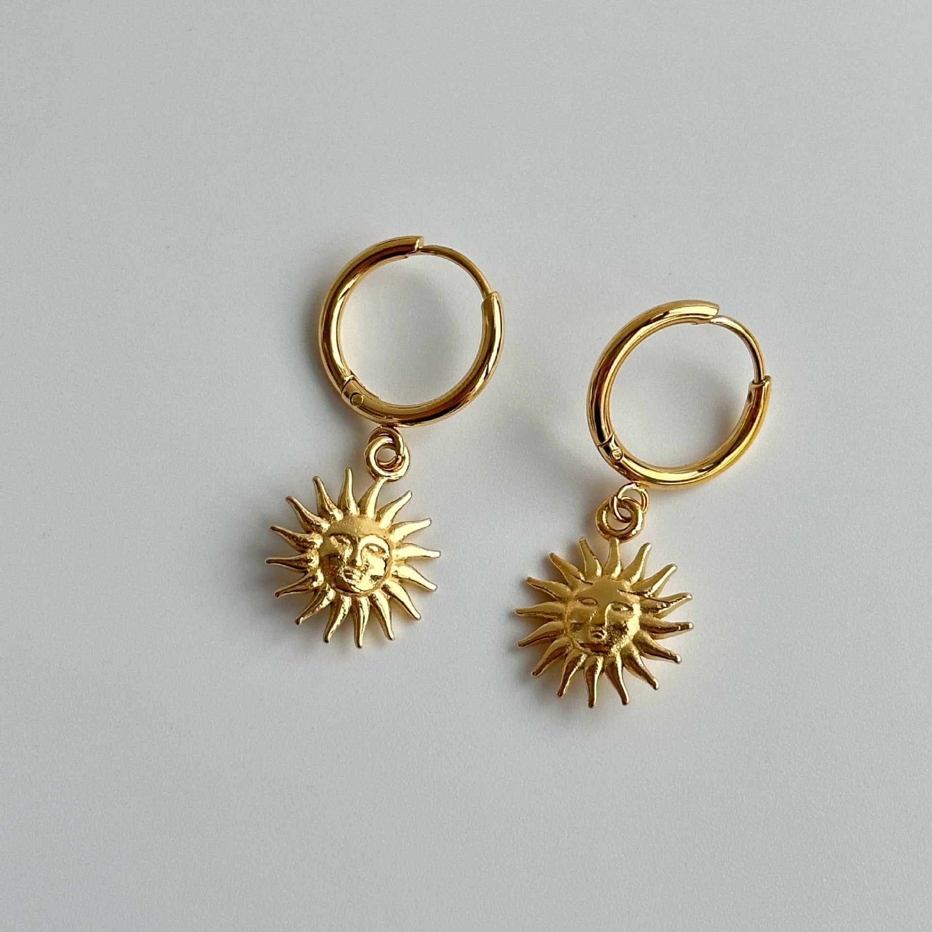 Gold Earrings Temperament Light Luxury Sun Element Trend Pendant Earrings Titanium Steel Plated