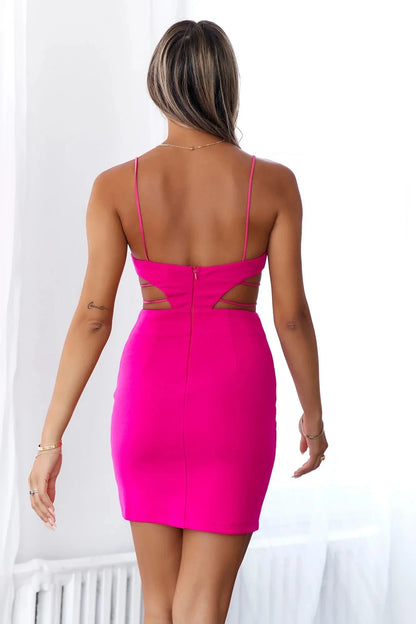A bright pink camisole short skirt with a thin camisole and a square neckline. The waist is designed with hollowed out straps on both sides, making it suitable for parties, dates, and more by YiHuiw