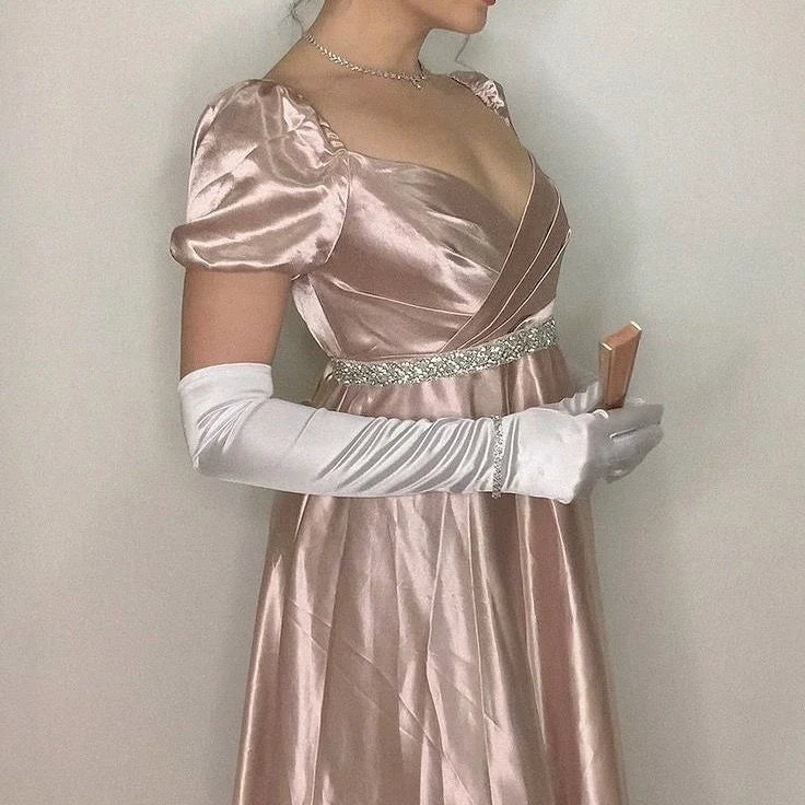 A light pink satin dress with a square neckline and bubble sleeves designed in a retro and elegant style, and a cross breasted rhinestone waistband outlining the curves, by YiHuiw