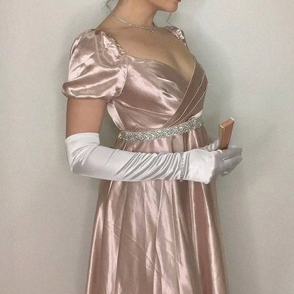 A light pink satin dress with a square neckline and bubble sleeves designed in a retro and elegant style, and a cross breasted rhinestone waistband outlining the curves, by YiHuiw