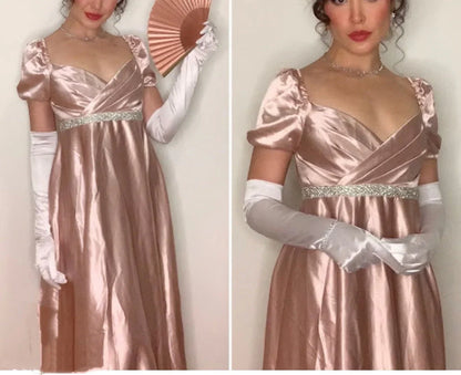 A light pink satin dress with a square neckline and bubble sleeves designed in a retro and elegant style, and a cross breasted rhinestone waistband outlining the curves, by YiHuiw