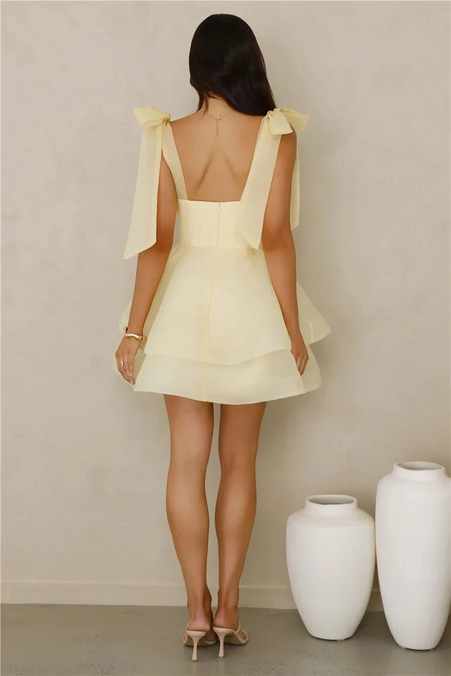A light yellow short dress with a square neckline and multi-layered fluffy skirt, suitable for parties, dates, etc by YiHuiw
