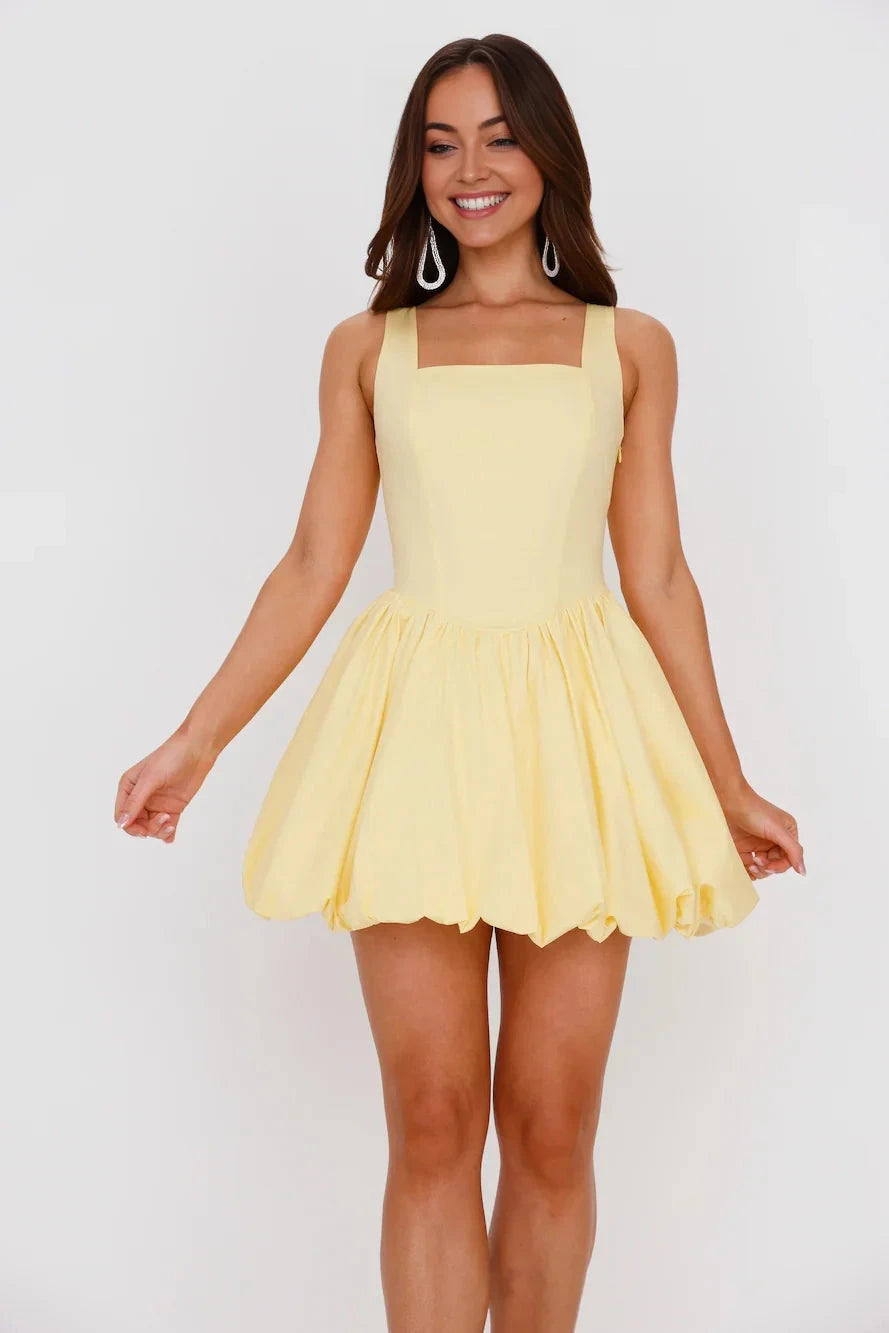 A light yellow square neck sleeveless dress with a fluffy floral bud style skirt suitable for dates, parties, and other occasions by YiHuiw
