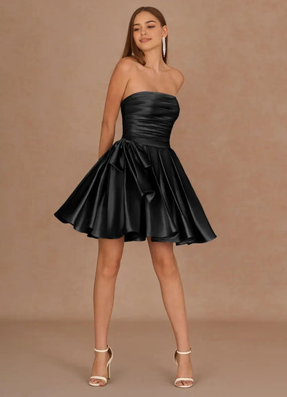 Black Strapless Mini Dress with Tiered Skirt and Bow Detail Aurae Black Mini Dress Homecoming Dresses by YiHuiw