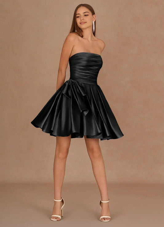 Black Strapless Mini Dress with Tiered Skirt and Bow Detail Aurae Black Mini Dress Homecoming Dresses by YiHuiw