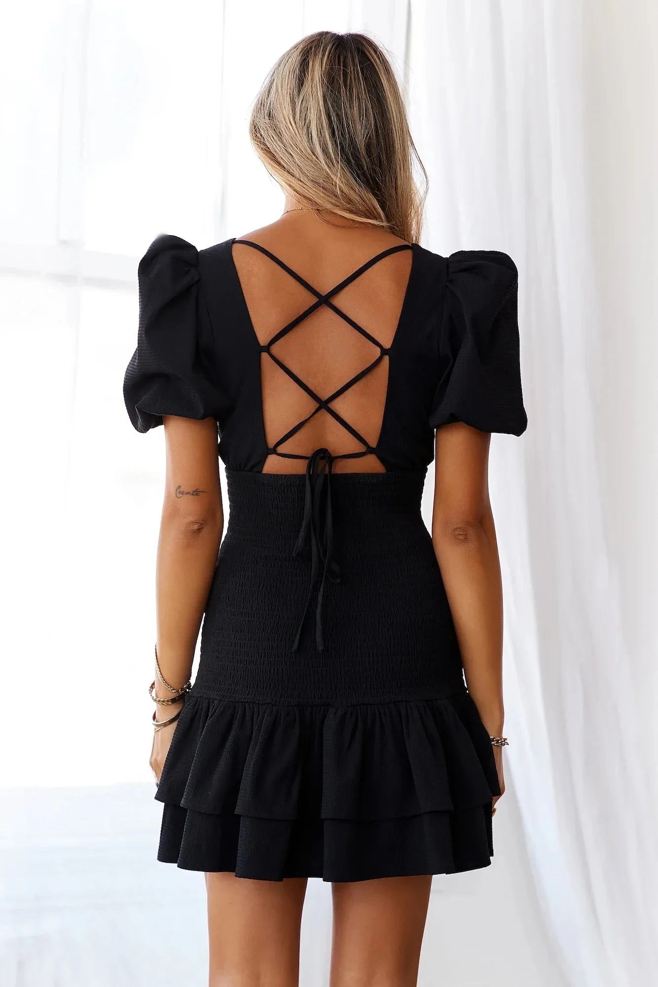 Black dress, deep V-neck, bubble short sleeved suitable for parties, dates, etc by YiHuiw