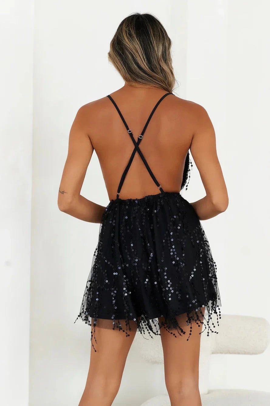 Black sequined deep V-neck dress with backless design and tassel embellishment on the skirt, suitable for parties, dances, and other occasions by YiHuiw