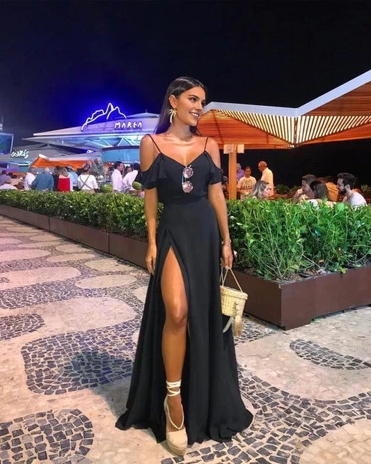 Black suspender long dress with thin suspenders and a deep V-neck design. The shoulders are decorated with ruffles, making it suitable for dinners, parties, and more by YiHuiw