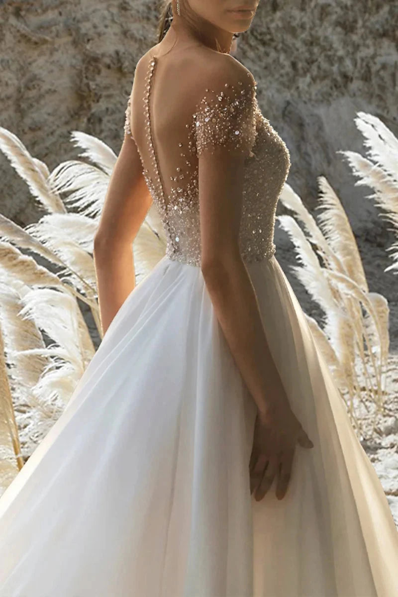 Bohemian Glitter & Chiffon Ballgown Illusion-Neck Cap-Sleeve Cathedral-Train Wedding Dress by YiHuiw