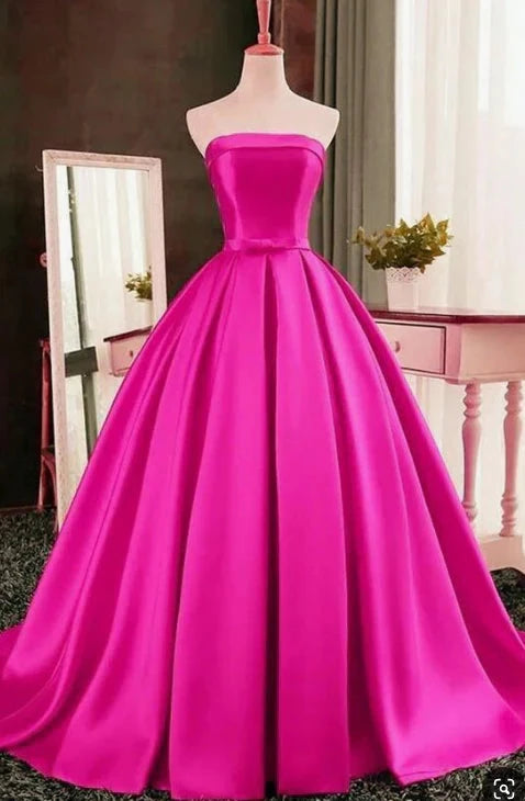 Bright pink strapless long dress with strapless design and bow decoration at the waist, suitable for dinners, parties, etc by YiHuiw