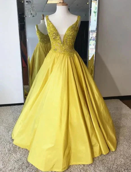 Bright yellow satin dress with deep V-neck design and exquisite bead embroidery decoration on the upper body by YiHuiw