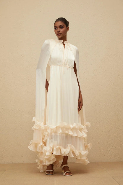 Cream Cape - Sleeve Maxi Dress with Ruffled Hem Intemporelle Neutral Cape Pleated Midi Dress Evening Dress by YiHuiw