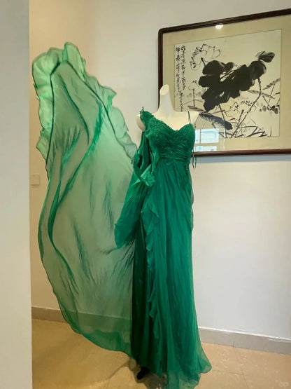 Dark green dress, made of lightweight yarn fabric, with a deep V-neck and asymmetrical floating sleeves by YiHuiw