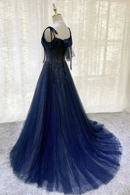 Deep blue mesh dress with suspender design and pleated nail beads embellishing the body by YiHuiw