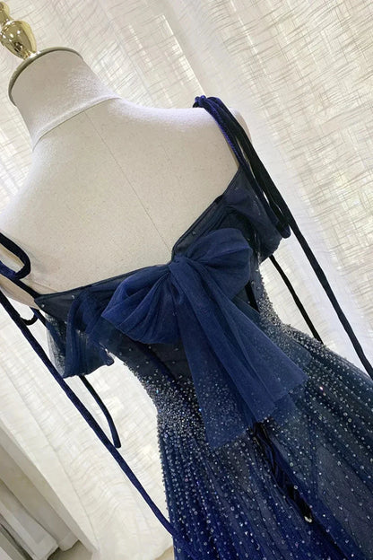Deep blue mesh dress with suspender design and pleated nail beads embellishing the body by YiHuiw