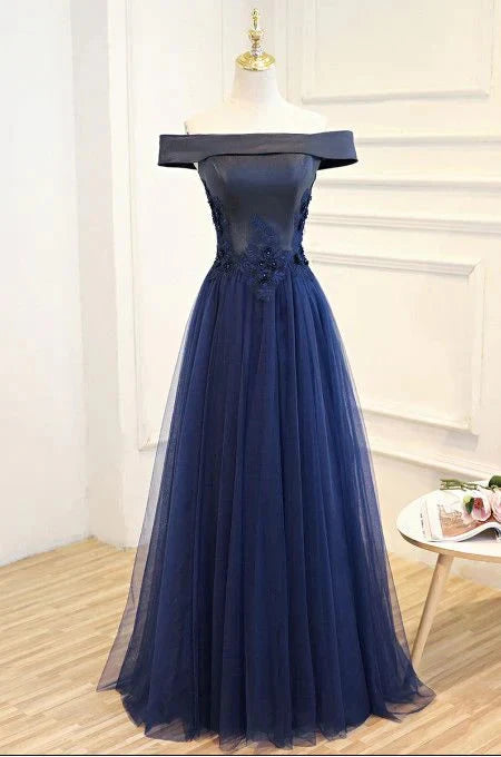 Deep blue off shoulder dress with a one shoulder design and exquisite lace embroidery on the upper body by YiHuiw