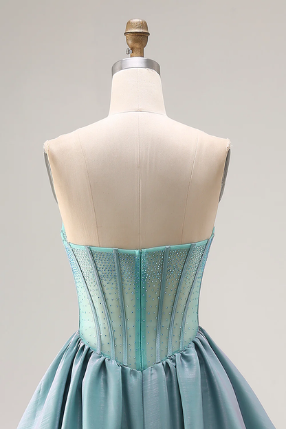 Robe de bal bustier éthérée à corsage perlé et jupe en taffetas étagée pour soirées de gala