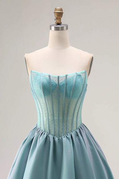 Robe de bal bustier éthérée à corsage perlé et jupe en taffetas étagée pour soirées de gala