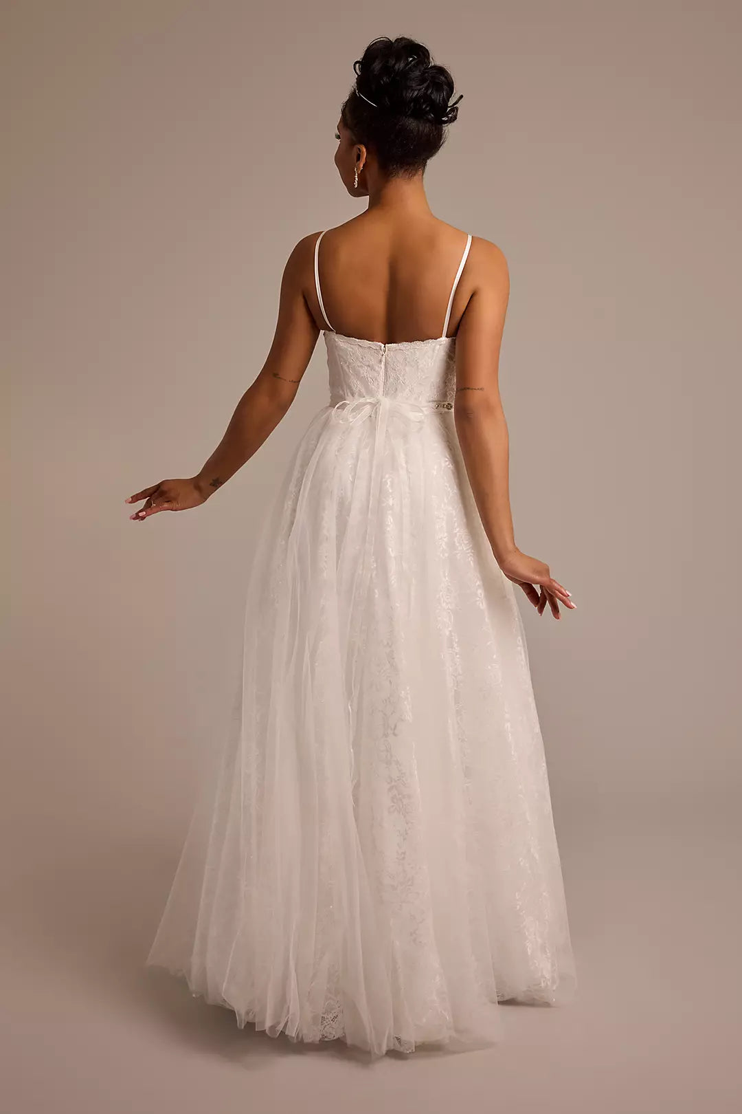 Fairytale Tulle A-Line Strapless Lace-Embellished Bow-Back Pocketed Wedding Dress