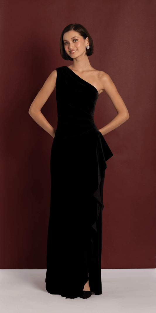 Glamorous black velvet evening dress with one-shoulder, ruffled slit, and floor-length silhouette
