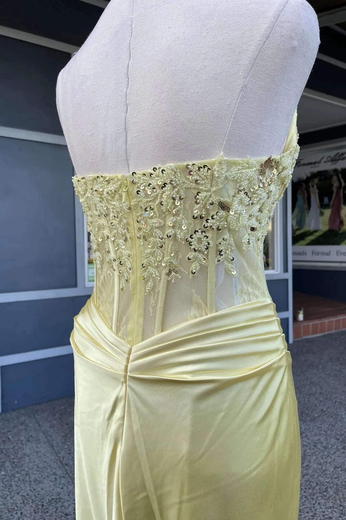Golden yellow satin prom dress with strapless sweetheart neck, beaded lace corset, ruched waist, and mermaid skirt by JiMiss Dresses