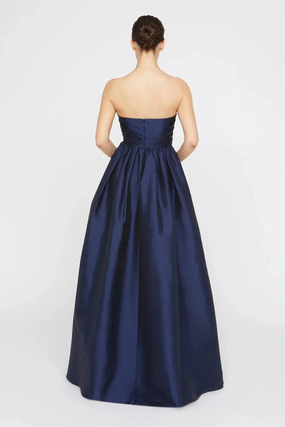 Graceful Ball Gown Strapless Sleeveless Ruffled Back Floor Length Prom Dress by YiHuiw