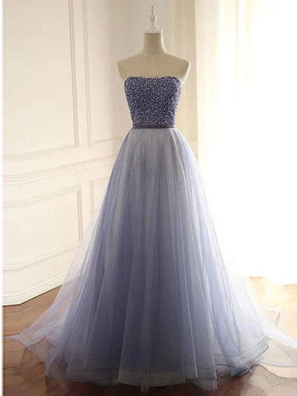 Gradient purple dress with strapless design, top half adorned with sequins by YiHuiw