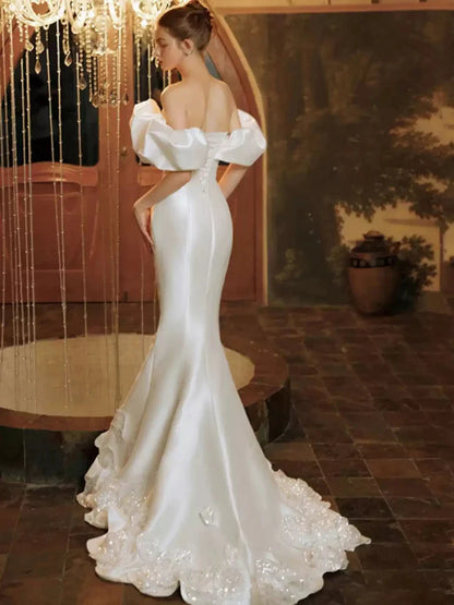 Ivory Satin Mermaid Wedding Dress with Off-the-Shoulder Ruffled Puff Sleeves, Sweetheart Neckline & Beaded Lace Train