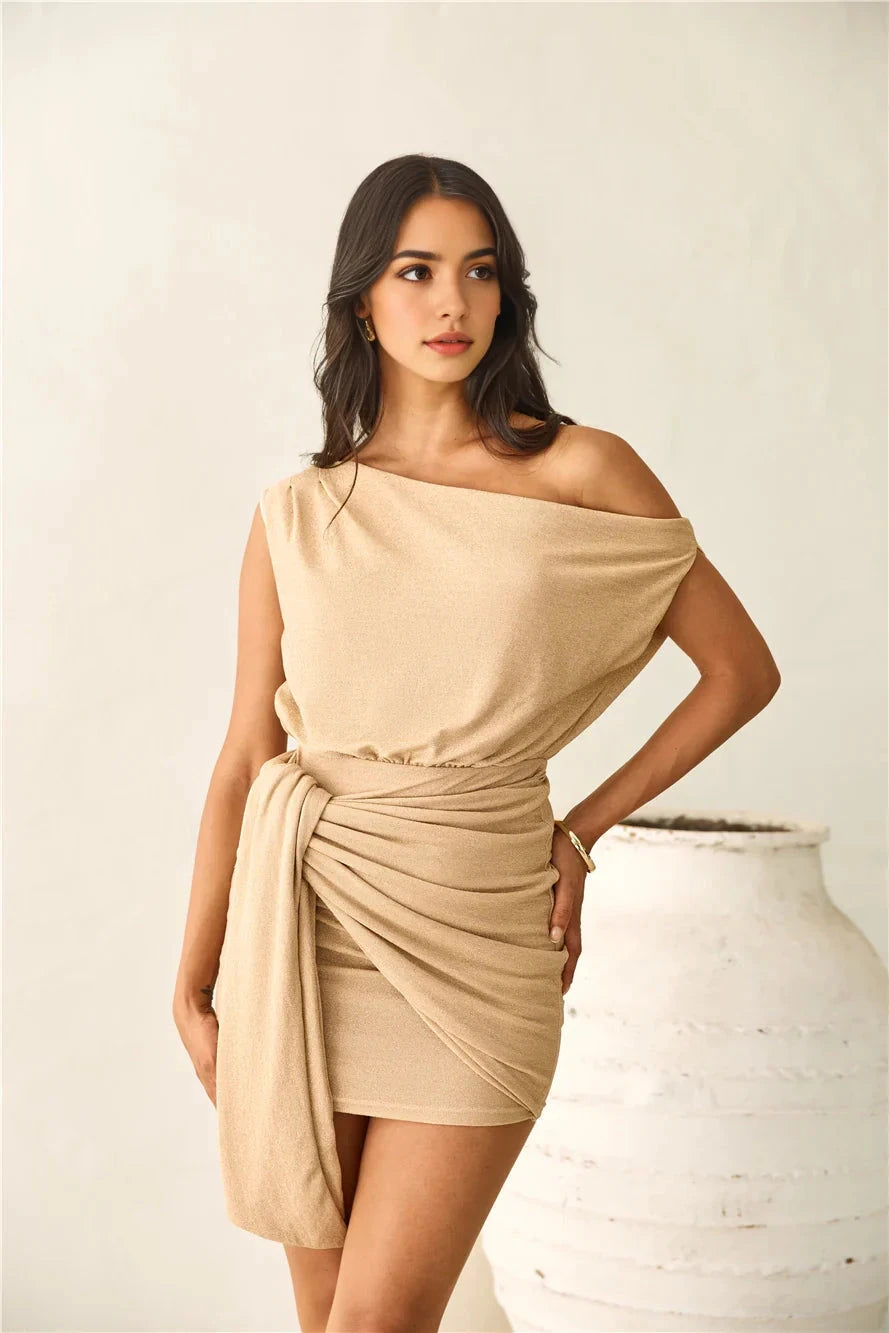 Light beige one shoulder short skirt with a unique pleated waistband design, suitable for parties, dates, etc by YiHuiw