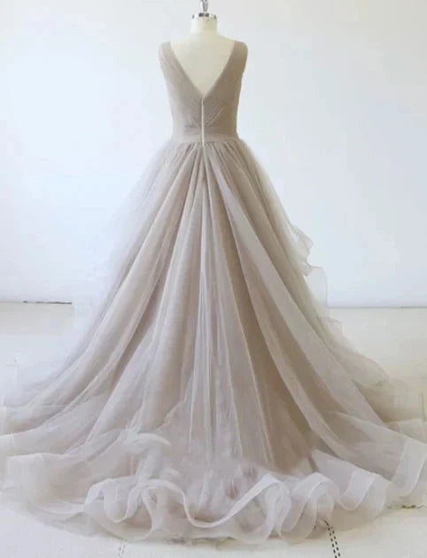 Light gray wedding dress with sleeveless deep V-neck and cross pleated upper body design for occasions such as dinners by YiHuiw