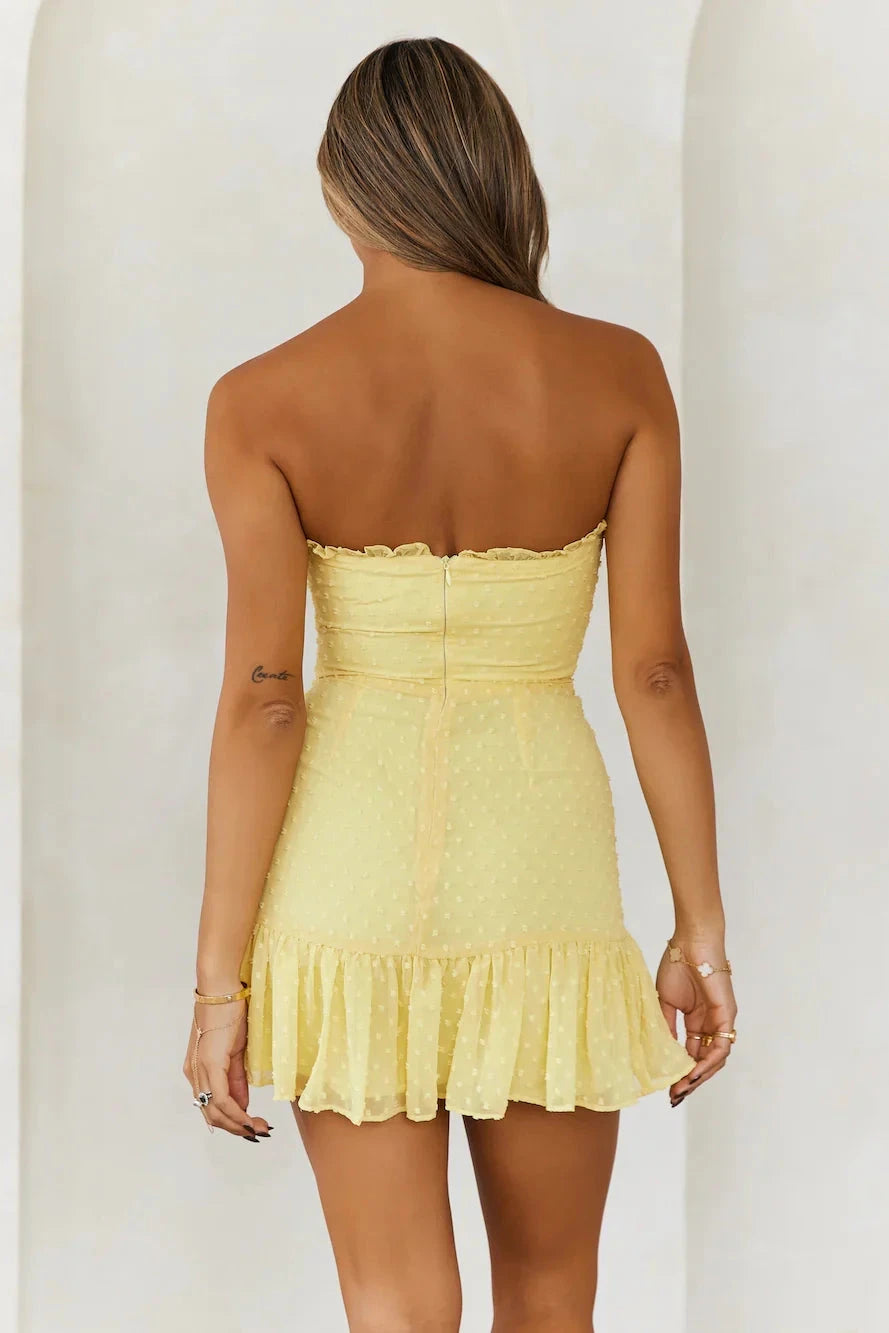 Light yellow strapless short dress with strapless design and polka dot texture on the body, suitable for parties, dates, etc by YiHuiw