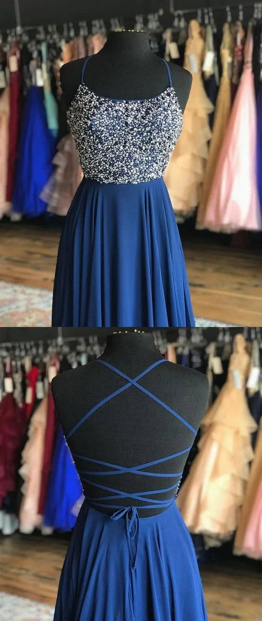 Long suspender dress with sequins or bead decorations on the upper body and a flowing deep blue skirt on the lower body, suitable for dinners, dances, etc by YiHuiw