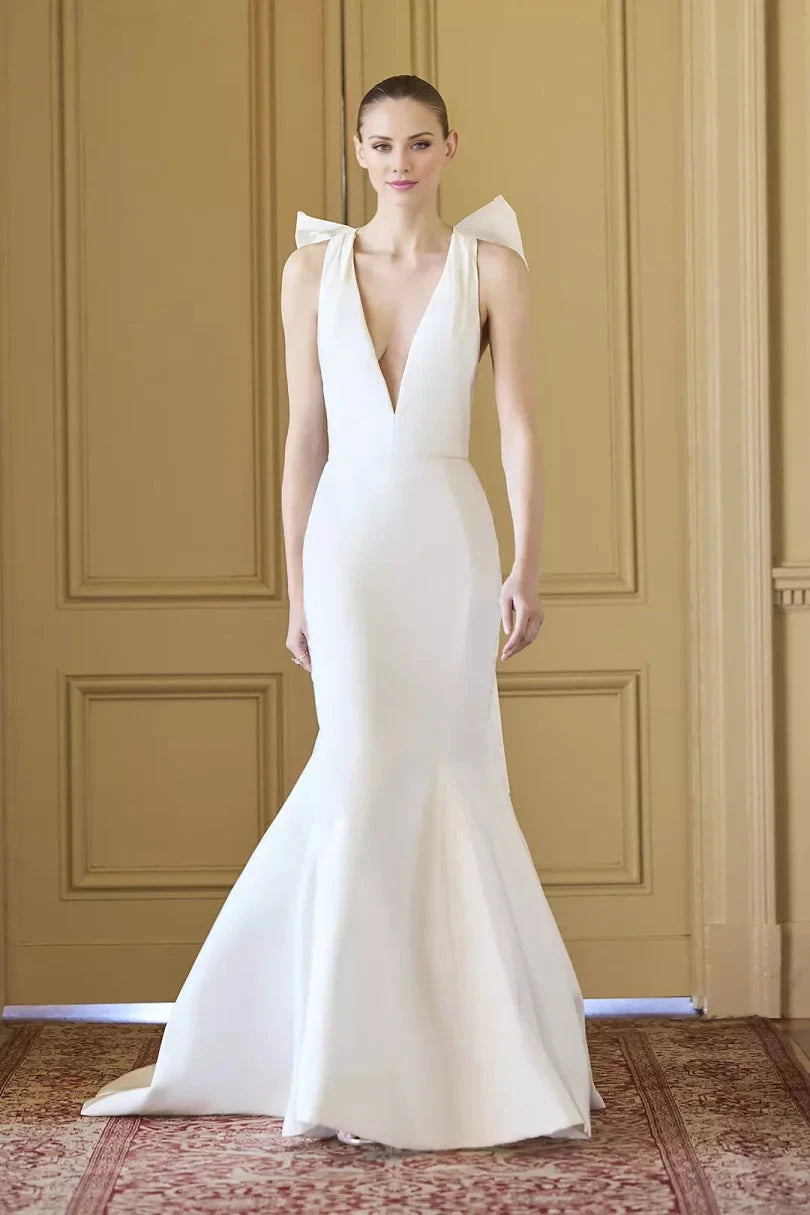 Luxurious Satin Mermaid Halter Deep-V Bow-Back Train Wedding Dress by YiHuiw