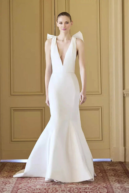 Luxurious Satin Mermaid Halter Deep-V Bow-Back Train Wedding Dress by YiHuiw