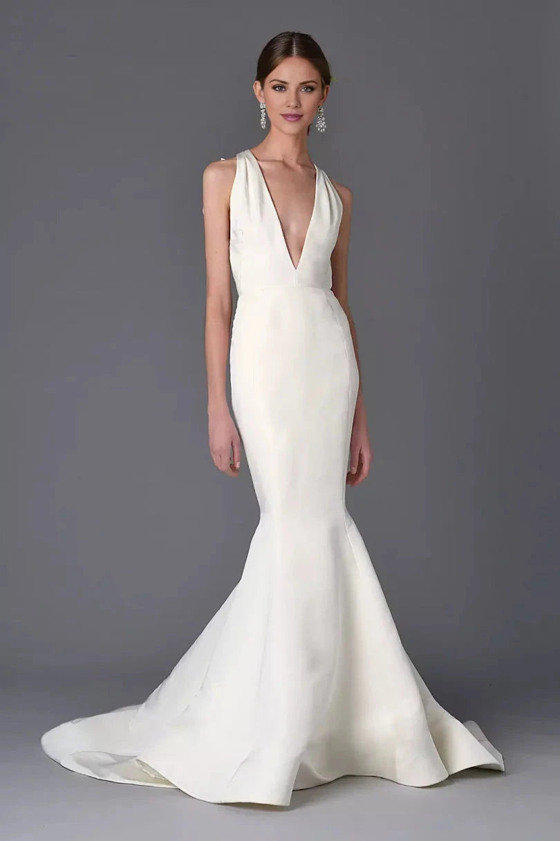 Luxurious Satin Mermaid Halter Deep-V Bow-Back Train Wedding Dress by YiHuiw